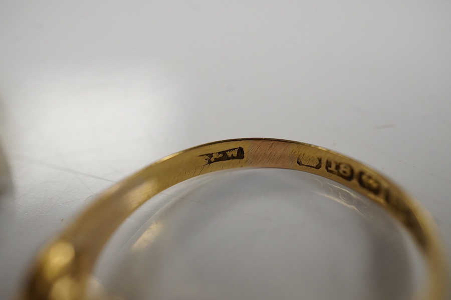 An early 29th century 18ct gold, ruby and diamond set ring, size M and a similar 18ct and graduated five stone diamond chip set ring, gross weight 5.1 grams. Condition - poor
